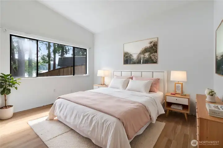 Virtually stage bonus room would make a great Primary bedroom - it looks out to the lakeside.
