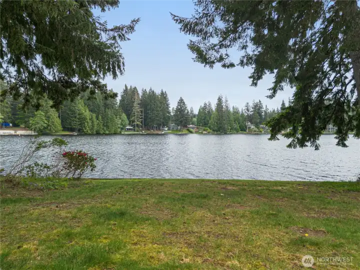 low bank waterfront and an expansive lawn and yard that will delight!