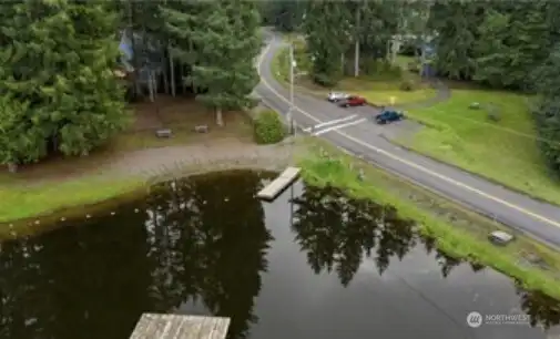 Swimming area with floating dock.