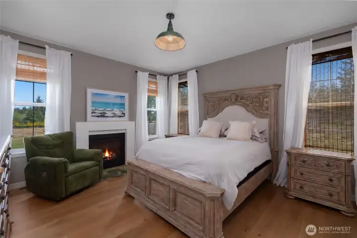 Primary Bedroom with fireplace and walk-in closet.