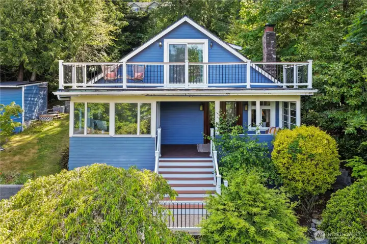 Stunning setting with sunset views toward Vashon Island and the Olympic Mountains just steps from public beach trail access.
