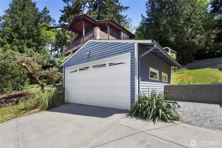 Detached 2-car garage with additional parking space provides flexibility for vehicles, hobbies, and storage.