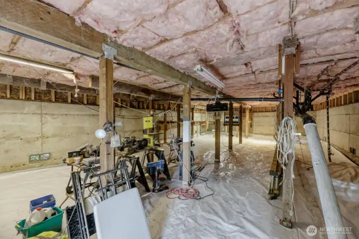 Unfinished Basement currently used as a Shop.