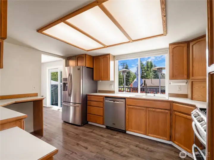 The kitchen is large with ample storage space and big pantry closet. The kitchen is large with ample storage space and big pantry closet.