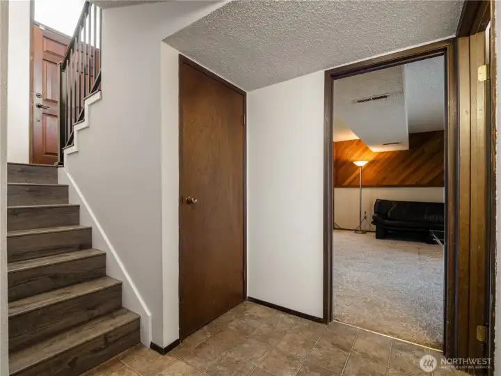 There is an abundance of storage space around and under the stairs. There is an abundance of storage space around and under the stairs.