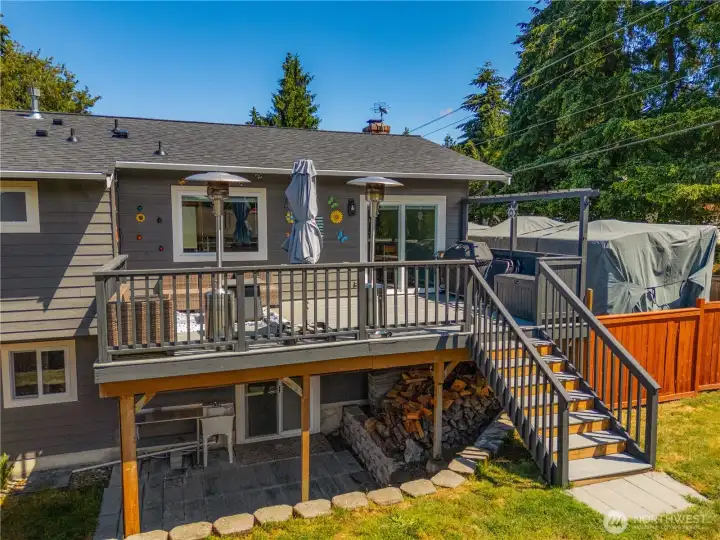 A great view of the back deck and covered patio below. A great view of the back deck and covered patio below.