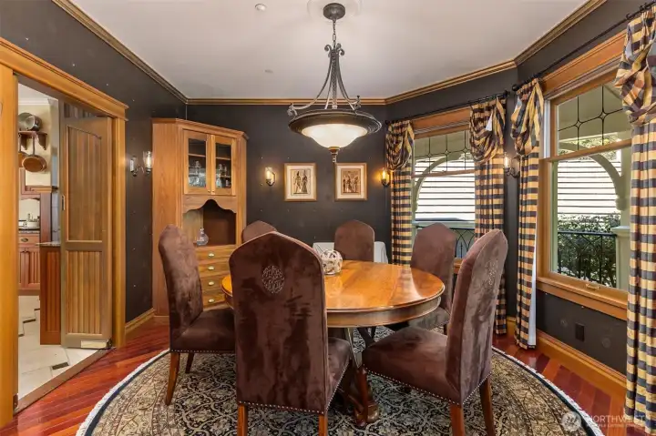 The dining room. The symbols (a Celtic shield knot) are featured in multiple places throughout the property. The dining room. The symbols (a Celtic shield knot) are featured in multiple places throughout the property.