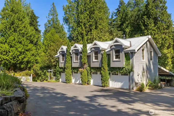 4 car detached garage. Two non-conforming 1-bedroom "apartments" sit above garages. 4 car detached garage. Two non-conforming 1-bedroom "apartments" sit above garages.