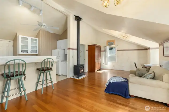 The living room and kitchen of one of the (non-conforming) "apartments." The other apartment is mirrored. The living room and kitchen of one of the (non-conforming) "apartments." The other apartment is mirrored.