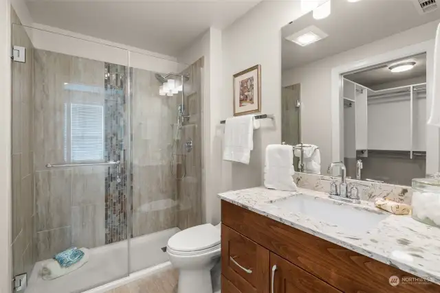 Primary bath with Quartz counters & custom tile shower