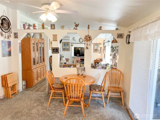 Dining area. Left is to the covered deck, straight through is to the 2nd and 3rd bedrooms and family room