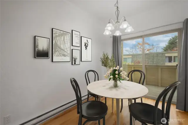 Spacious Dining Area with Hardwood Floors, overlooking 1 or 2 decks.