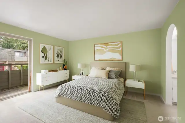 Primary bedroom with separate sink and deck.