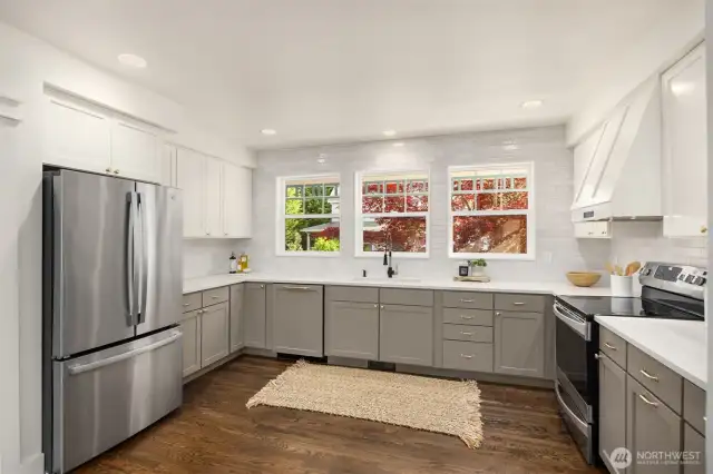 Newly re-finished hardwoods add depth to the space.