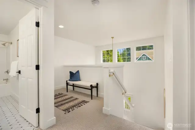The upstairs landing connects the rest of the house.