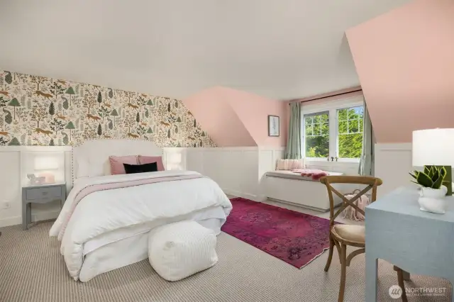 Charming paneling and stick on wallpaper make this space feel like a precious doll house.