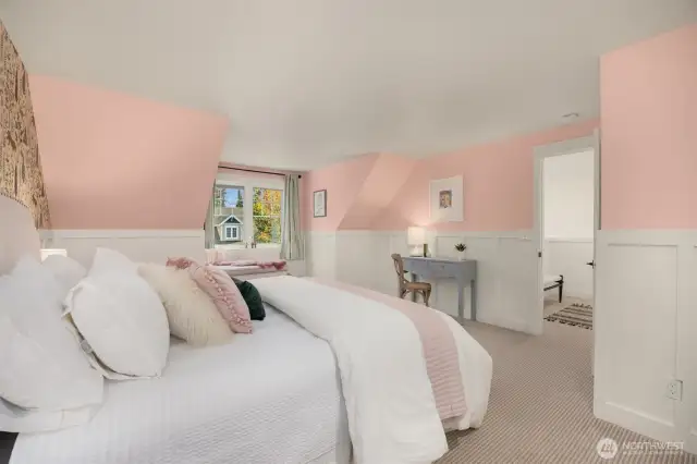 Complete with cozy window seat (with incredible storage) and a huge closset.