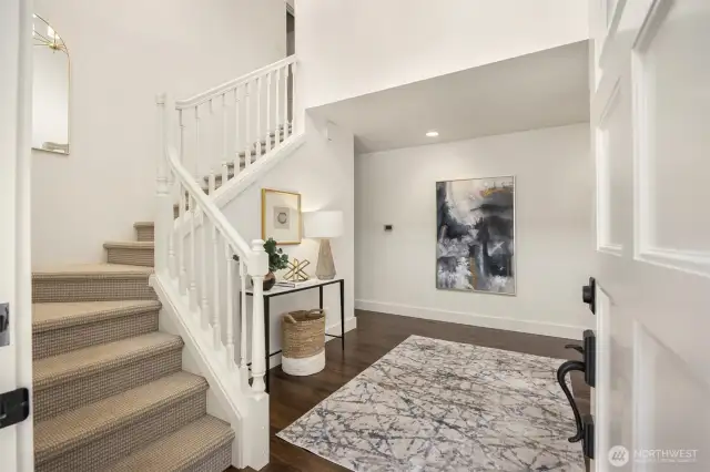 This grand entrance is flooded with natural light.