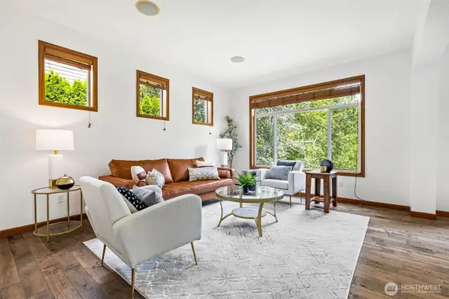 Elegant yet cozy space bathed in natural light—perfect for entertaining or quiet moments.