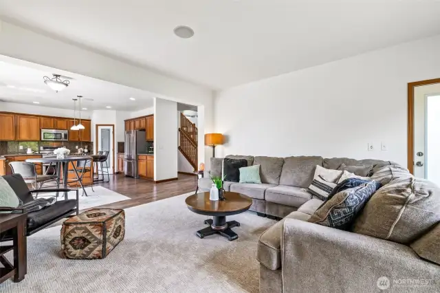 Whether it’s movie night by the fireplace or a sunny afternoon on the patio, this family room adapts to your rhythm.