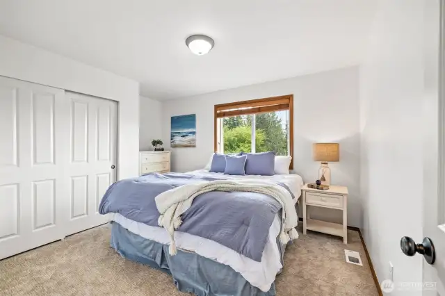 Three additional bedrooms offer space for family, guests, or hobbies.