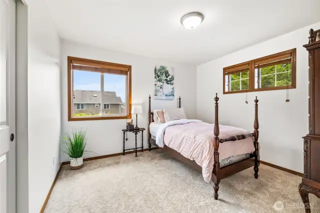 Three additional bedrooms offer space for family, guests, or hobbies.
