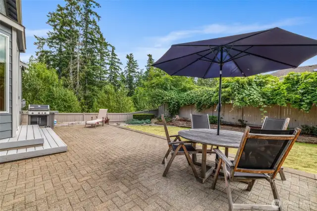 Enjoy a level lawn and beautifully crafted patio surrounded by a peaceful greenbelt for privacy and calm.