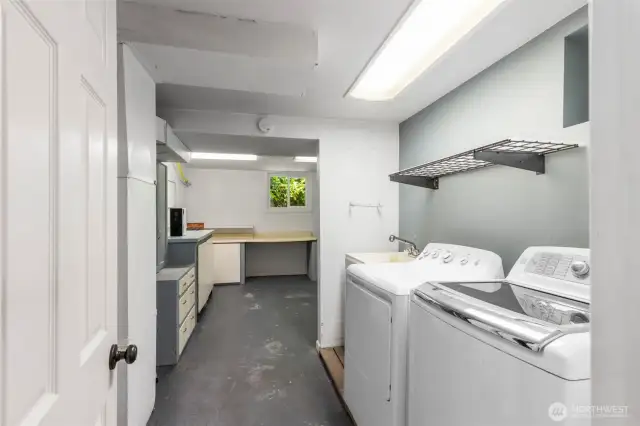 Basement utility room with laundry