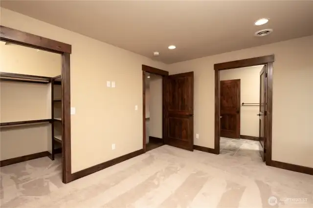 ADU M bedroom with walk-in closet toward M bath