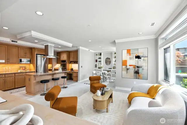 Lovely family room and kitchen for comfortable open concept living and relaxing. The space is designed for ease of entertaining and everyday family life.