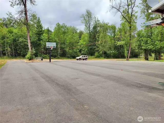 Large Paved Driveway in front of Garages
