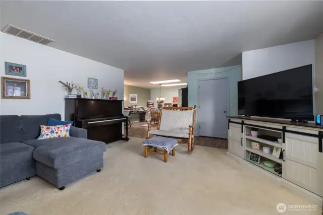Unit A, front room looking toward dining room