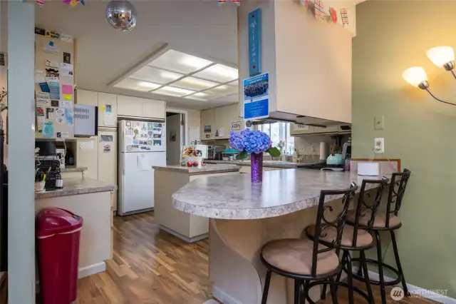 Eat-in kitchen in Unit A, with plenty of counterspace and a center island.
