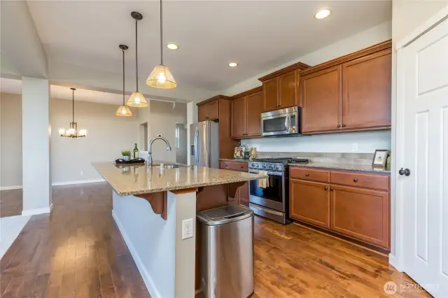 Large center island and convenient walk-in corner pantry