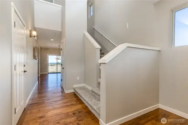 2-Story entry foyer with garage on the left and half bath to the right