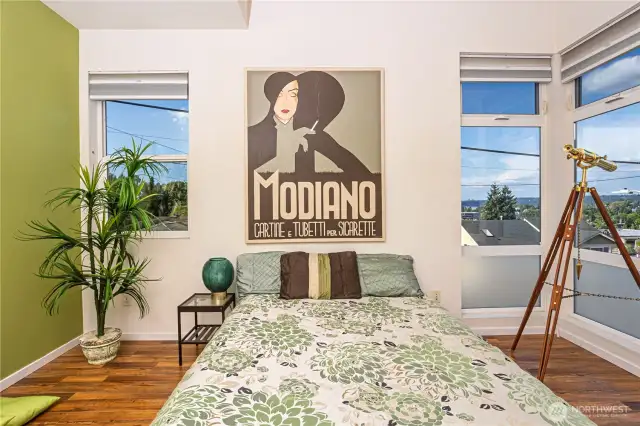 Master bedroom with stunning views of city lake and mountians