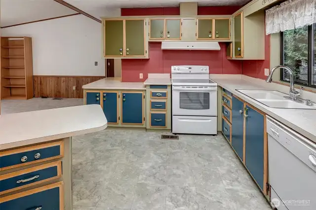Oversized kitchen with eating space.