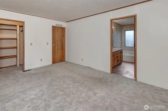 Large primary bedroom with attached bath.