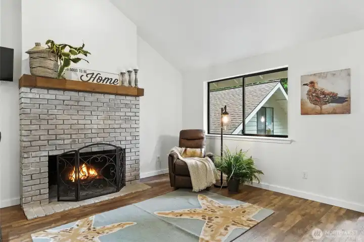 Upstairs living room #1 with wood burning fireplace (another one in the adjacent 2nd living room)