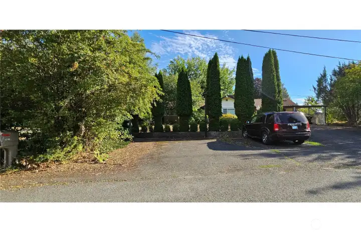 Extra paved parking on your property for your cars, trucks, RV's.