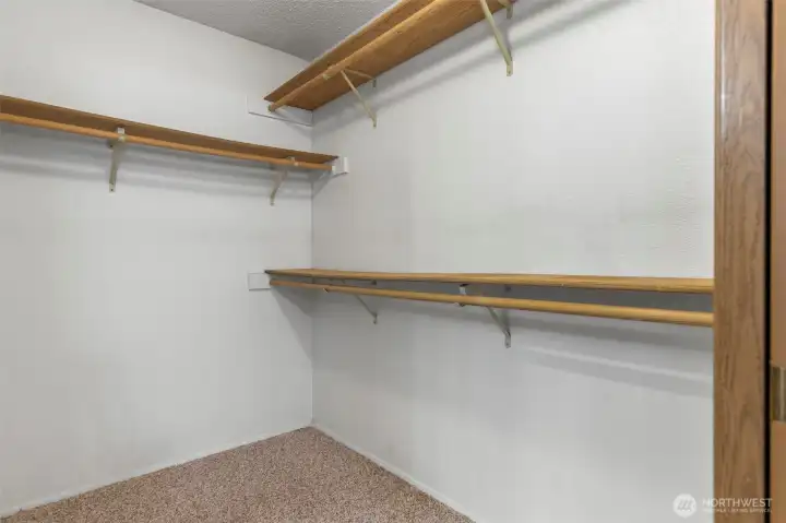 Walk-in closet in the primary