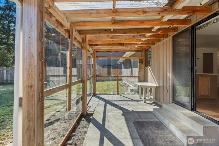 Large covered patio off the kitchen and dining area