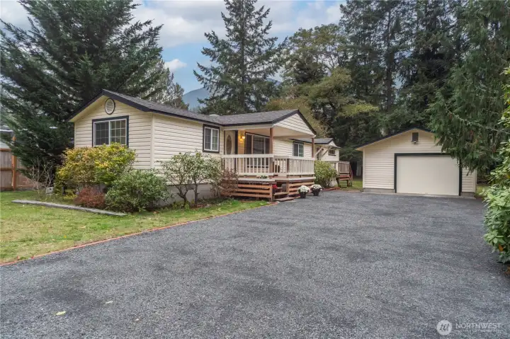 Clean well-kept home with separate garage and workshop.