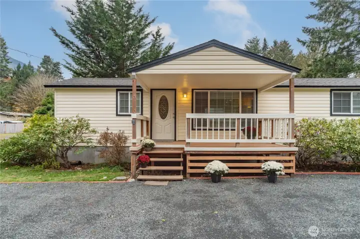 Covered front porch is a nice place to relax or entertain.