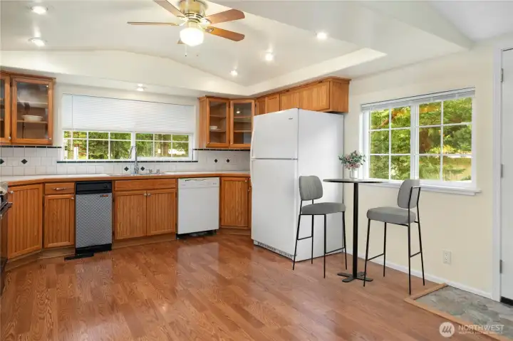 Lots of counter space and room for a table or island in the kitchen. Refrigerator and compactor are newer.