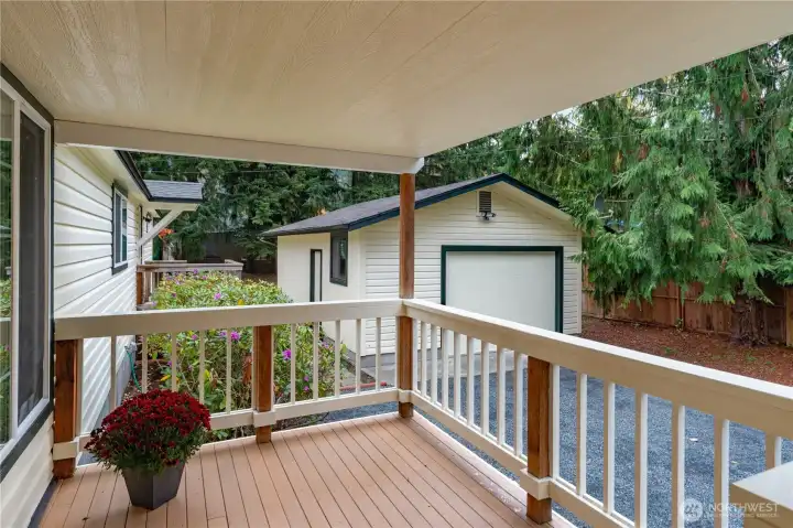 There is a deck off of the living room and another off of the hallway outside of the primary bedroom. There is also a third deck in the back off of the kitchen.