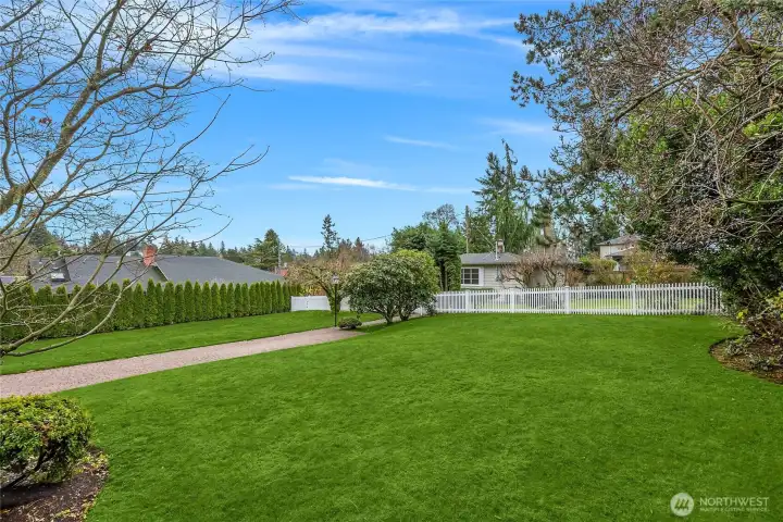 Great topography, great neighborhood & fabulous upside potential for a savvy investor/builder!!!