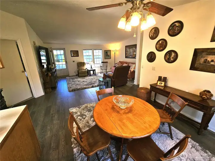 Dining room with ceiling fan.
