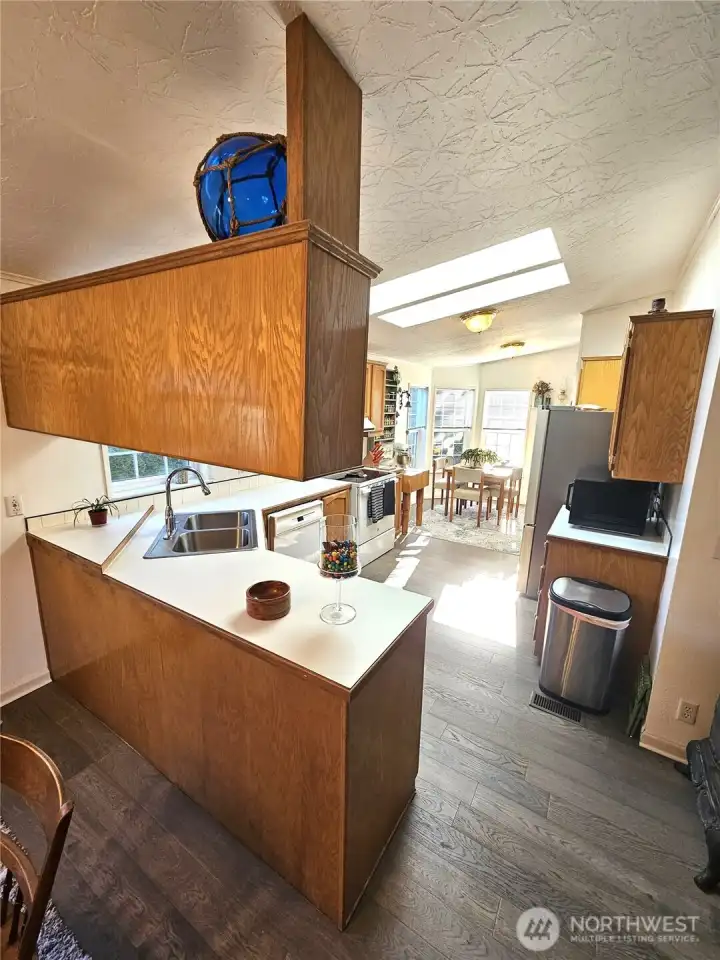 Loads of counter space and plenty of cupboards in the kitchen.