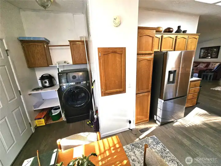 Convenient utility area located near the back door.